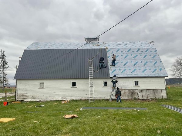 Standing seam metal roof on barn in Fremont